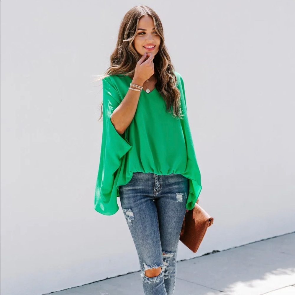 Statement made blouse in emerald green (sold out on vici)